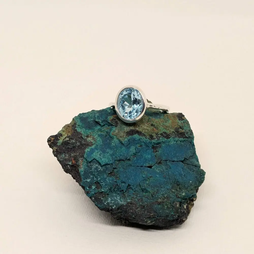 Blue Topaz Oval Ring with Hand‑Beaten Band - Size 8