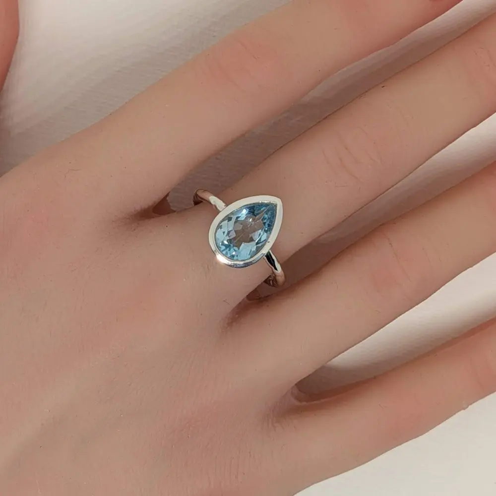 Blue Topaz Pear‑Shaped Ring - Sizes 6 - 8